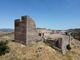 Torre del homenaje del castillo de Montemolín desde el oeste